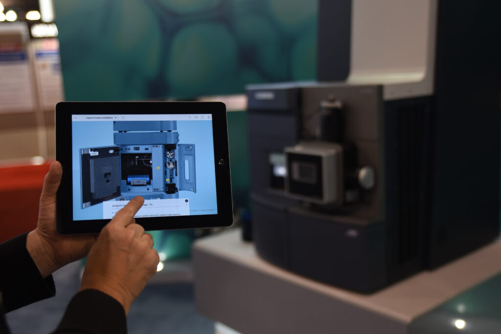 Waters 3D Product Tour in trade show booth with physical product