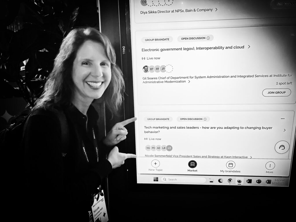 Nicole showing Kaon's Braindate session on the board at Dell Technologies World